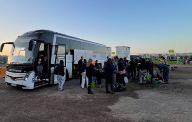 An image of a National Express coach at Glastonbury